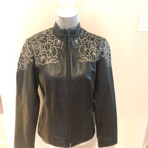 100% lamb leather from kenar. Black& white